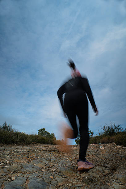 istock Motion Blur of Person Running on Rocky Path 2255133771