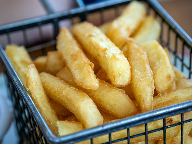istock French fries served in a basked at restaurant 2255135239