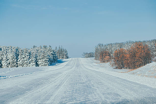 istock Ice and Snow Covered Country Road 2255136207