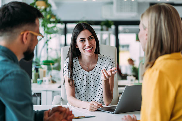 istock Group of business persons talking in the office. 2255145990