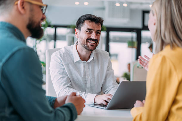 istock Group of business persons talking in the office. 2255145994