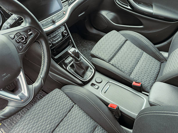 Inside a modern vehicle, the comfortable seats and well-designed dashboard create a welcoming space. Cutting-edge controls and elegant materials enhance the driving experience.