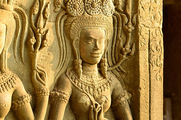 A relief carving on the wall of an ancient temple in Cambodia