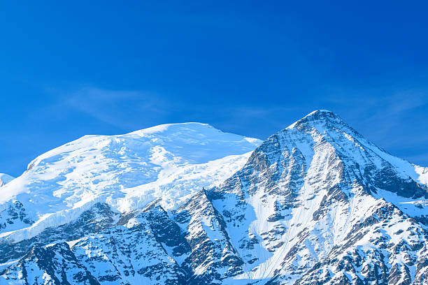Beautiful landscape aerial view from helicopter of Talefre glacier and Chamonix needles from Mont Blanc massif in french Alps mountains during a sunny autumn day.