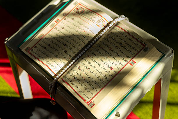 Sunlight reflecting on pages of the Quran