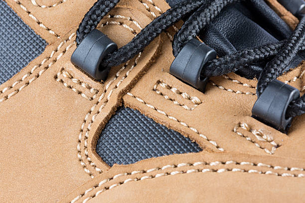 Close up (macro photography) of seams on leather safety shoes