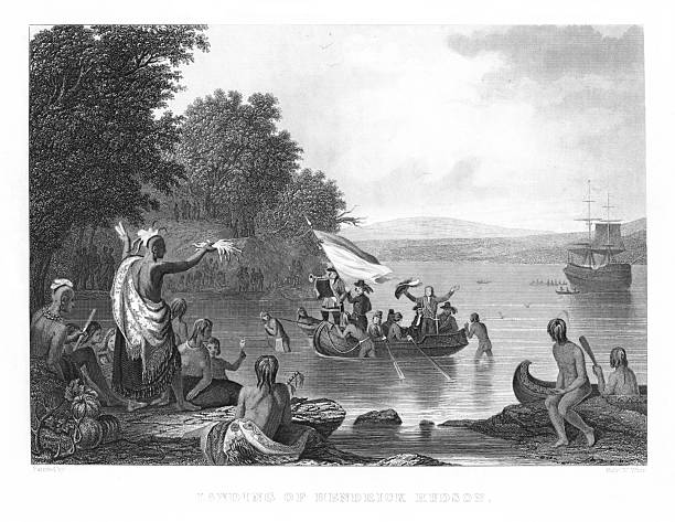 Native Americans watch Henry Hudson’s Dutch ship off-shore in 1609. The Dutch East India Company sent Henry Hudson to settle New York. Steel engraved illustration published 1874. Copyright expired; artwork is in Public Domain.