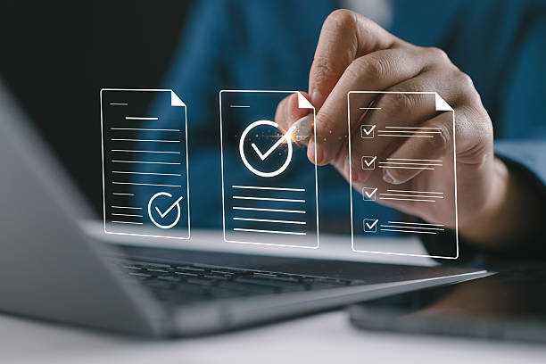istock Businessman checking audit documents, regulatory compliance, focusing on financial audit and internal audit strategies for accurate business management. 2255167758