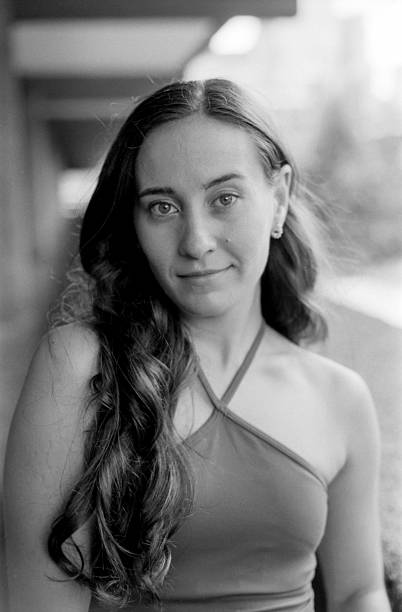 istock Young woman posing for analog black and white portrait 2255168259