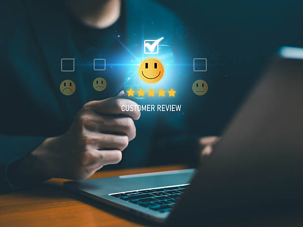 istock Customer review and satisfaction survey concept with five star rating and smiley feedback icons on digital interface, representing service quality, positive experience, customer engagement 2255176348