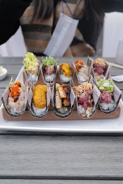 Assorted fresh and raw hand roll sushi at Japanese restaurant