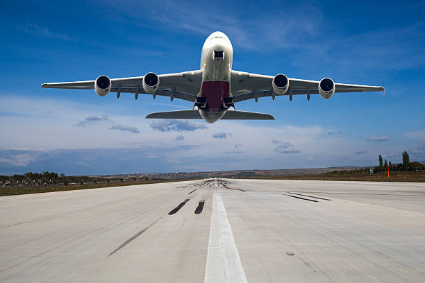 istock XXL jet airplane landing in cloudy sky 2255182920