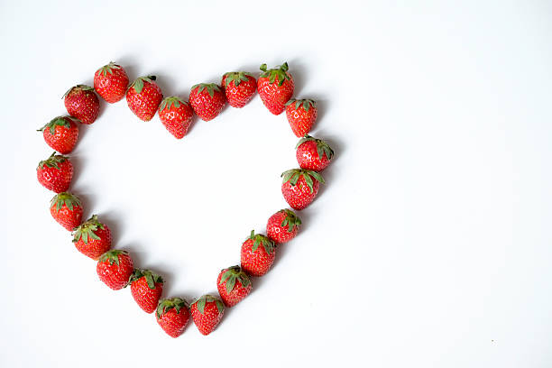 istock Strawberry in heart shape isolated on white background 2255184644