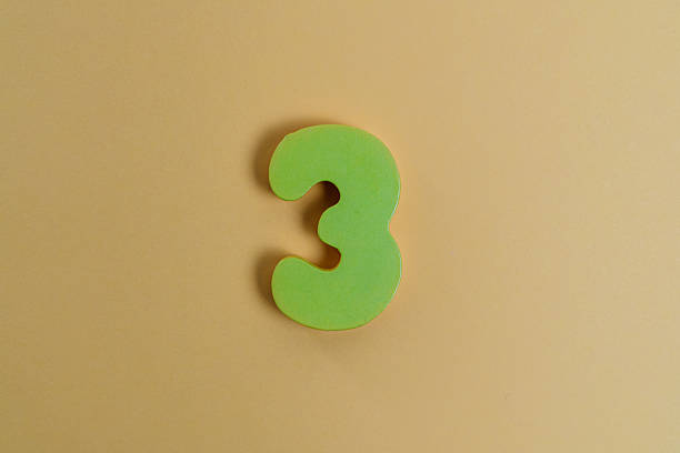 Child Holding Number 3
