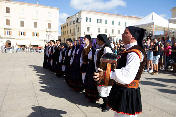 september 04 2022 - Italy - Sassari - The ancient cultural and folklore event Cavalcata Sarda presents typical costumes of the Sardinian people different in each country, with Knights and Amazons in traditional clothes.