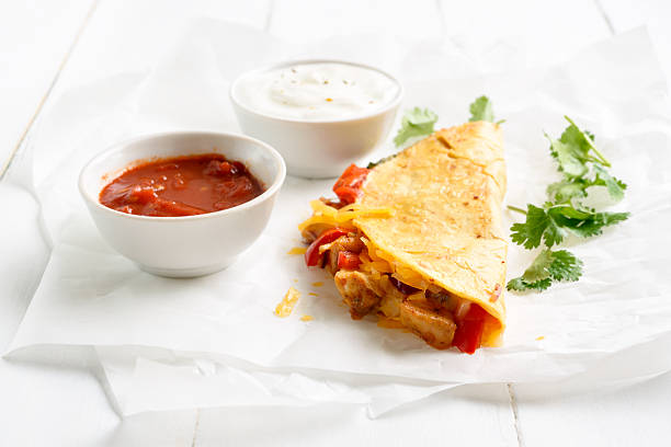 mexican quesadilla with chicken, tomato, sweet corn and cheese