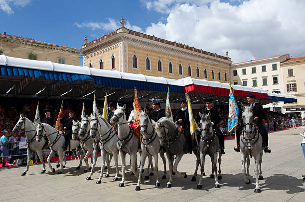 september 04 2022 - Italy - Sassari - The ancient cultural and folklore event Cavalcata Sarda presents typical costumes of the Sardinian people different in each country, with Knights and Amazons in traditional clothes.