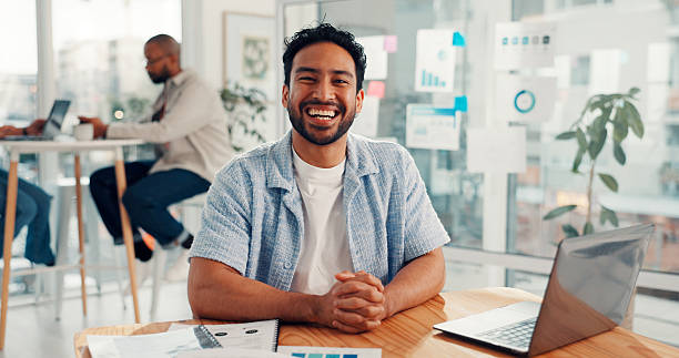 istock Paperwork, business man or happy with laptop in office for campaign oversight, KPI data or coworking. Marketing manager, portrait or chart for brand performance, project management or website traffic 2255195440