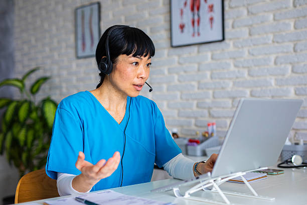 istock Healthcare Professional Using Headset for Telemedicine Call 2255196848