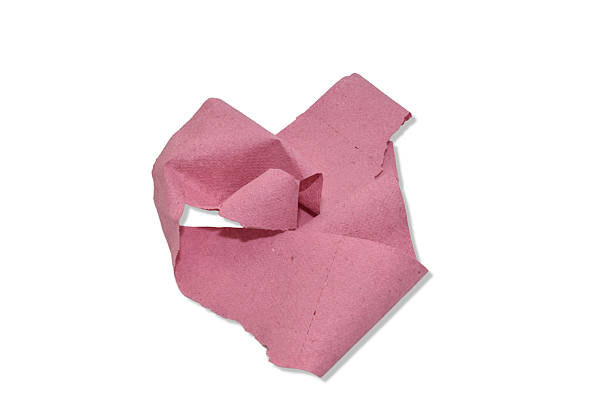 Red toilet paper isolated on white.