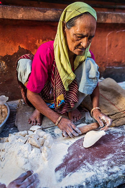 istock Indian street vendor preparing food - chapatti, flat bread 2255209848