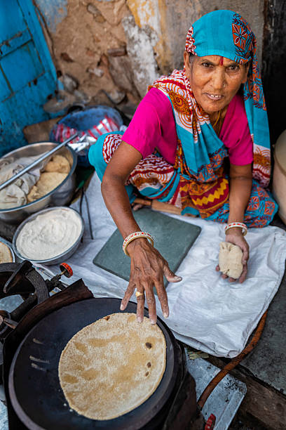 istock Indian street vendor preparing food - chapatti, flat bread 2255210081