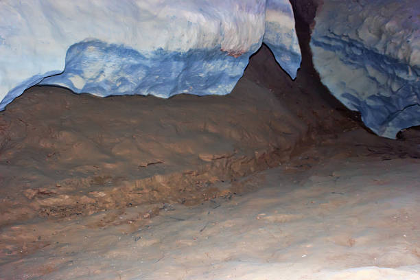 Speleology. Old cave washed by an underground river in the mountain. - Ponor (swallow hole), gypsum cave. Bizarre forms of stalactites and gypsum incrustations (speleothem). Laos