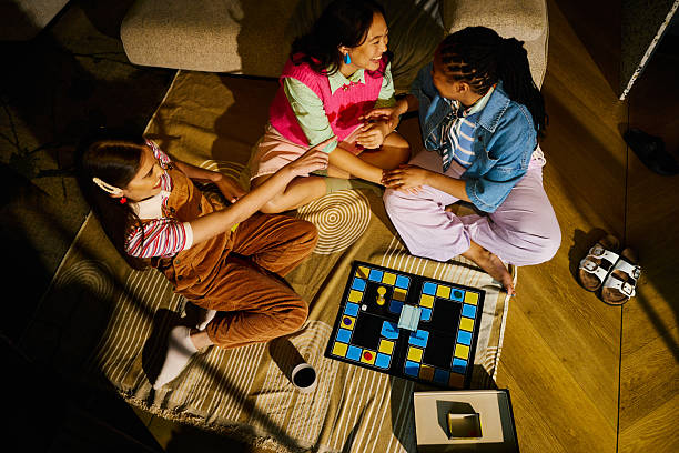 West Palm Beach, USA - April 28, 2011: A partial view of the Monopoly game board showing the corner with the Go To Jail square. Monopoly is owned and manufactured by Hasbro.