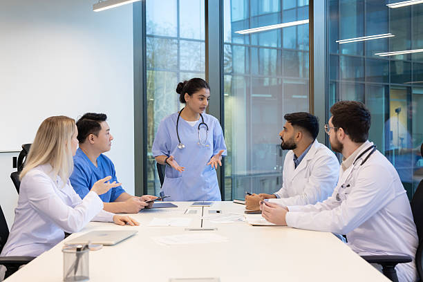 istock Medical professionals holding a meeting at a modern office setting. 2255225055