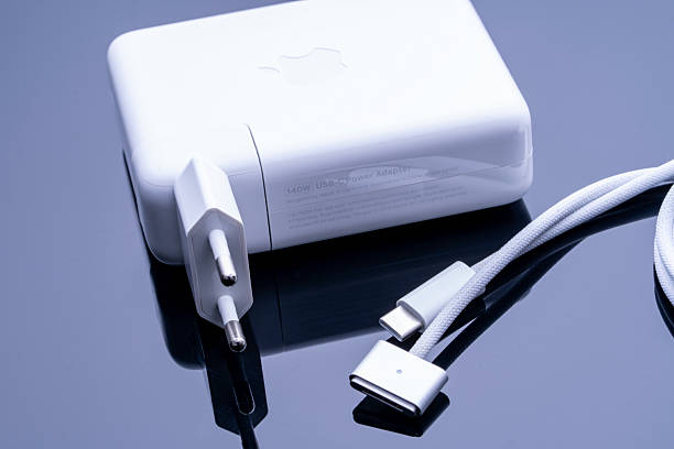 Moscow, January 08 2026, Charging for a macbook on a black background. High quality photo