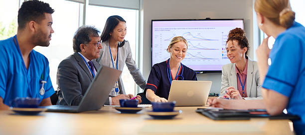 istock happy medical business meeting 2255235968