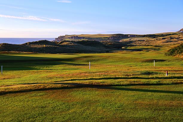 Turnberry, Scotland, UK - August 4, 2016: The view over the championship Ailsa golf course looking towards the Trump Turnberry Luxury Resort hotel. The golf course is in Ayrshire on the west coast of Scotland. The hotel and golf course was bought by Donald Trump and reopened in 2016 after an eight month refurbishment.