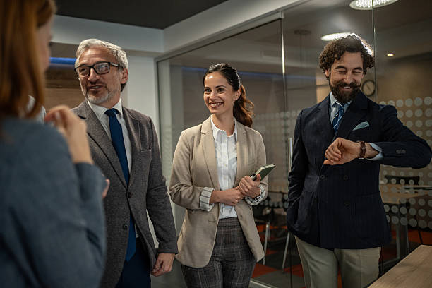 istock Business colleagues collaborating and discussing in modern office 2255261320