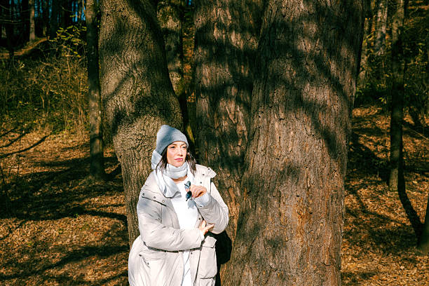 Young adult caucasian female on nature trail in woods