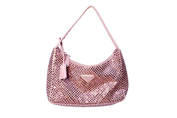 Studio shot of a pink rhinestone shoulder bag displayed from front back and side view isolated on a white background featuring a sparkling crystal embellished surface short strap compact size and glamorous design suitable for womens fashion evening accessories ecommerce catalogue and luxury product presentation