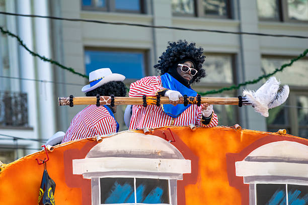 New Orleans, LA - February 9, 2016: New Orleans Mardi Gras celebration featuring ornate parade floats and festive participants.