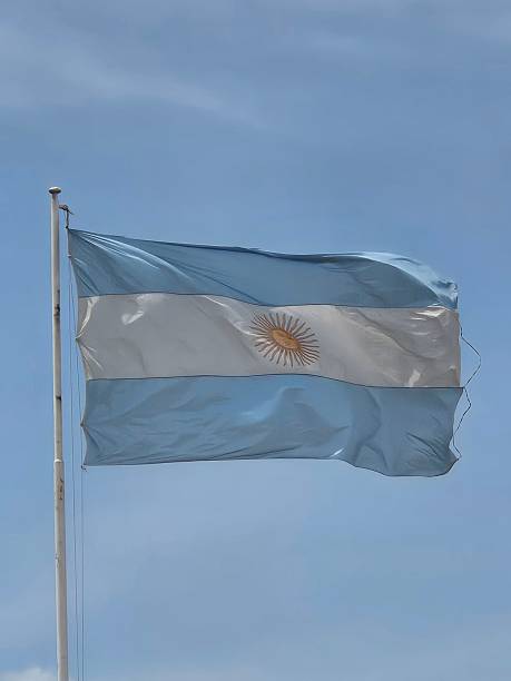 istock Argentine Flag Waving Against Blue Sky 2255281207