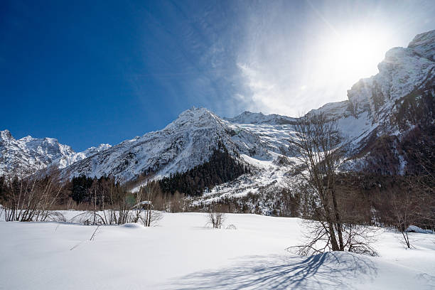 Panoramic landscape Alps mountain peak. Winter sport, ski resort.  Enjoying on  sunny  ski resorts. Powder snow Snowcapped mountain  Dolomite super ski area. Italian Alps, Ski resort italy, Europe
