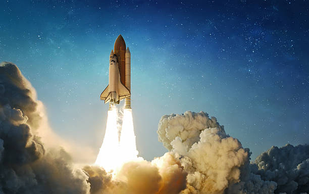 istock Space shuttle flight from Earth surface into space. The spacecraft in a cloudy night sky. The launch of rocket carrying astronauts into outer space. Elements of this image furnished by NASA. Not AI. 2255285909