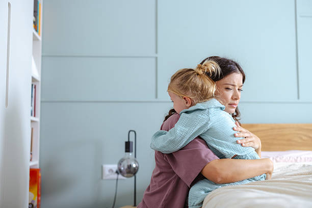 istock Mother hugging her upset daughter 2255286769