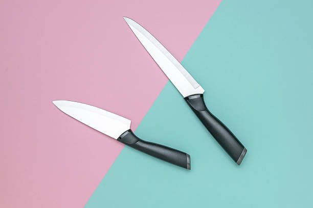 Modern Kitchen Knives on Pastel Backgrounds for Culinary and Design Themes