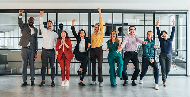 istock Business team celabrating after achieving goals 2255294630
