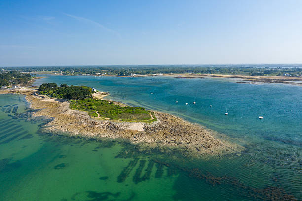 istock Lush peninsula and oyster beds in blue bay 2255295333