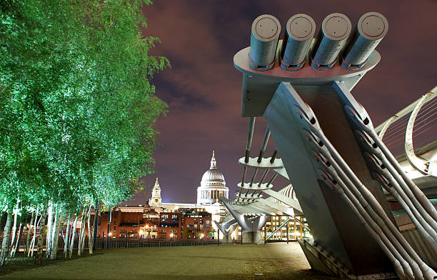 View of the Millennium Bridge in London at night