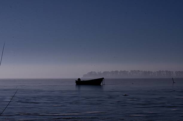 Boat on frozen lake