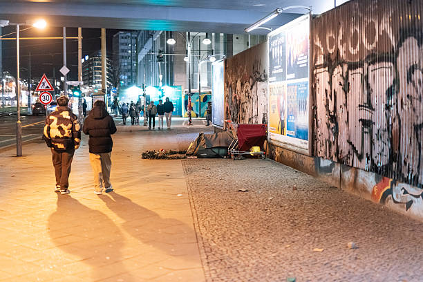 Reading, Berkshire, England, April 8th. 2024: Homeless person sleeping rough outside the Entrance to a warehouse