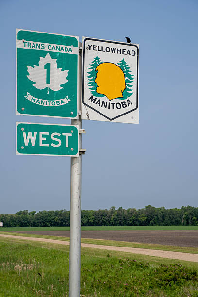 istock Trans Canada Highway 1 and Yellowhead Highway signs in rural Manitoba, Canada 2255308689