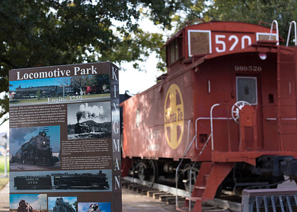 St. Jacobs, Canada - August 17, 2024: A historic passenger train from Waterloo Central Railways is seen backing into Farmers Market Station. The train consists of a GMD1 locomotive from General Motors Diesel and several passenger cars.