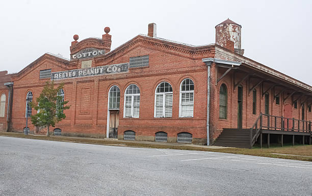 A perspective of a historic peanut factory building in Eufaula, Alabama