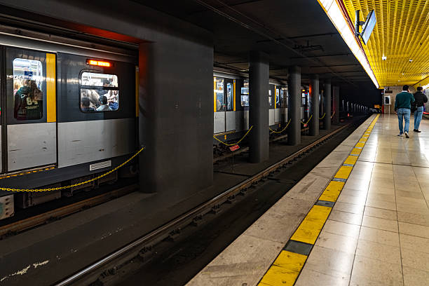 MILAN, ITALY - October 12, 2025:  Tourists are wait the subway. The view of Centrale FS Subway station, Milan, Italy.
